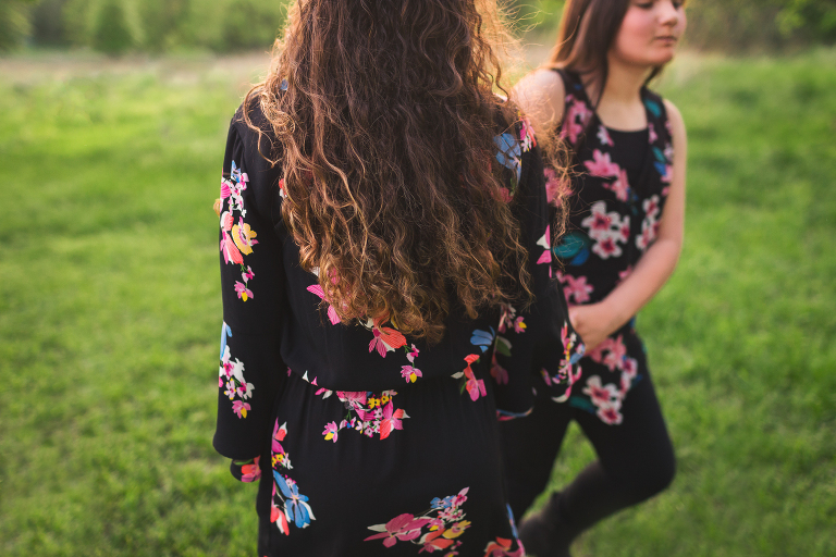 Two sisters dancing in the sunset KGriggs Photography | St. Louis Family Portraits