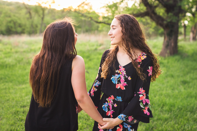 Two sisters singing and dancing in Queeny Park | St. Louis Photographer