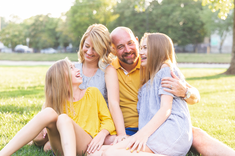 Family snuggles during photo shoot | St. Louis Photographer