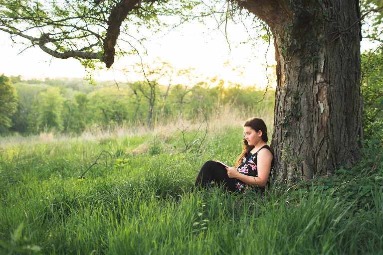 Young girl sitting under a tree in Queeny Park KGriggs Photography | St. Louis Family Photos